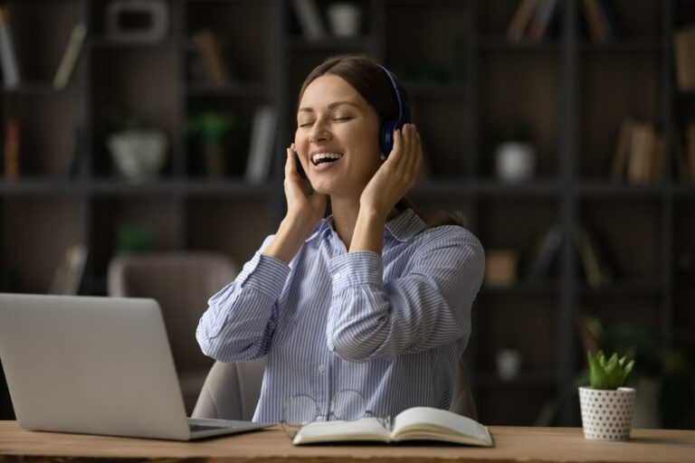 Peaceful woman Woman listening to calming sounds in her headphones